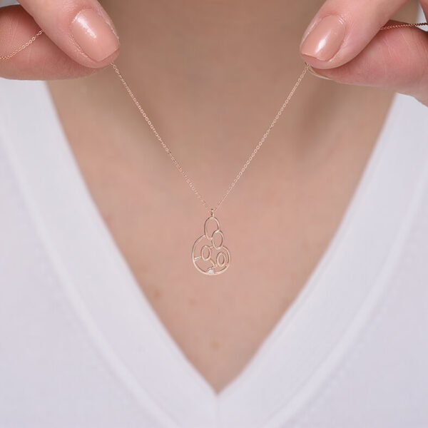 Mutlu aile pırlanta ve altın kolye