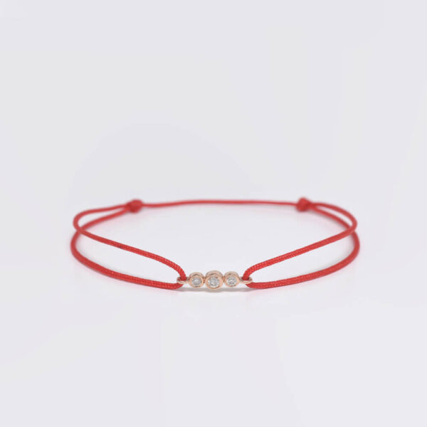 Üç Taş pırlanta ve altın ip bileklik