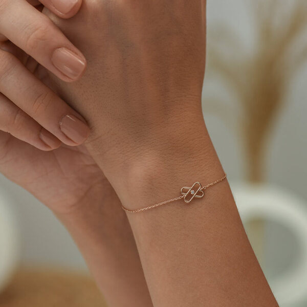 Çarpı pırlanta ve altın bileklik