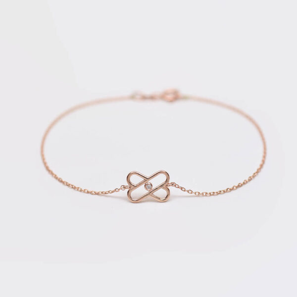 Çarpı pırlanta ve altın bileklik