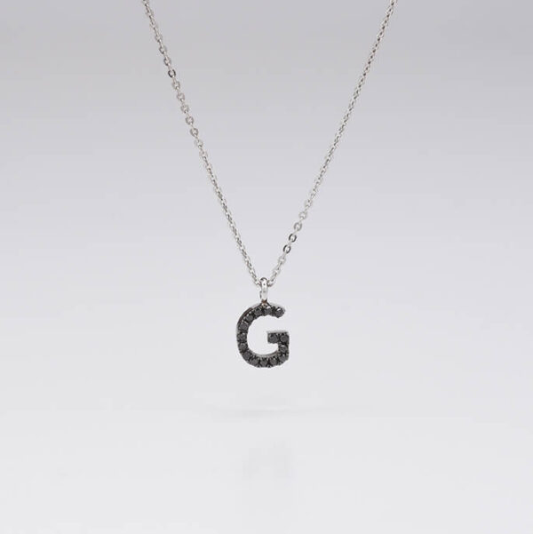 G harf siyah pırlanta ve altın kolye